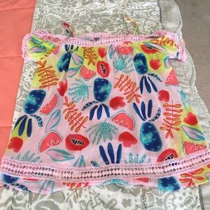 Off the shoulder floral shirt.